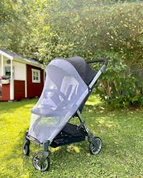 Preventing mosquito bites includes placing a net on a stroller