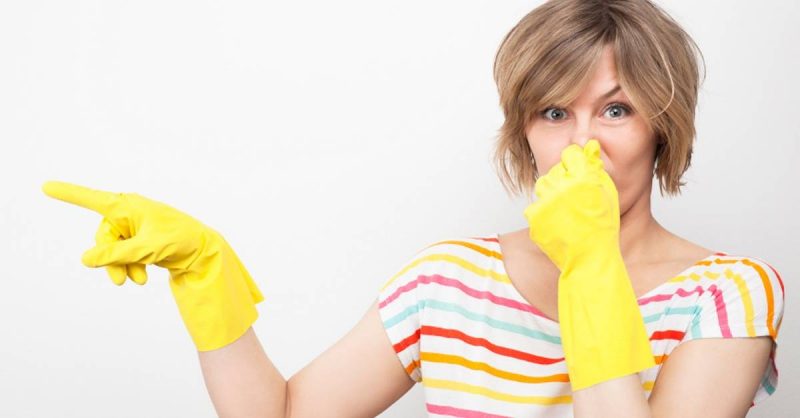 Woman trying to fight off the bugs